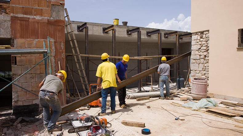 Building repair (franco lucato/Shutterstock.com)