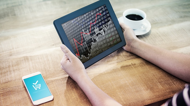 Buying shares (wavebreakmedia/Shutterstock.com)