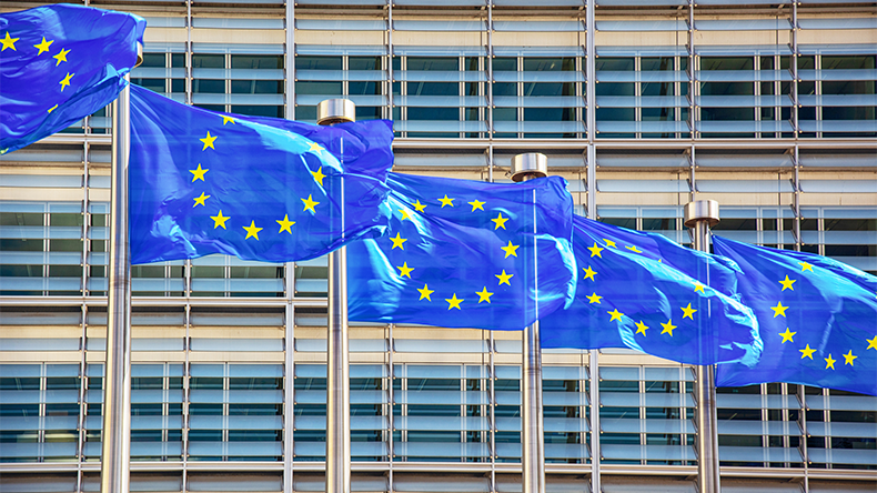 EU flags in front of the Berlaymont building, headquarters of the European Commission in Brussels