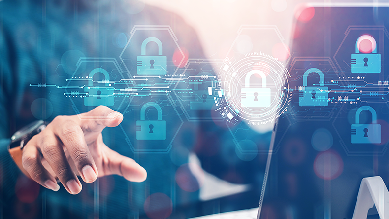 A businessman shows how to protect a cyber technology network from attacks by hackers on the Internet.