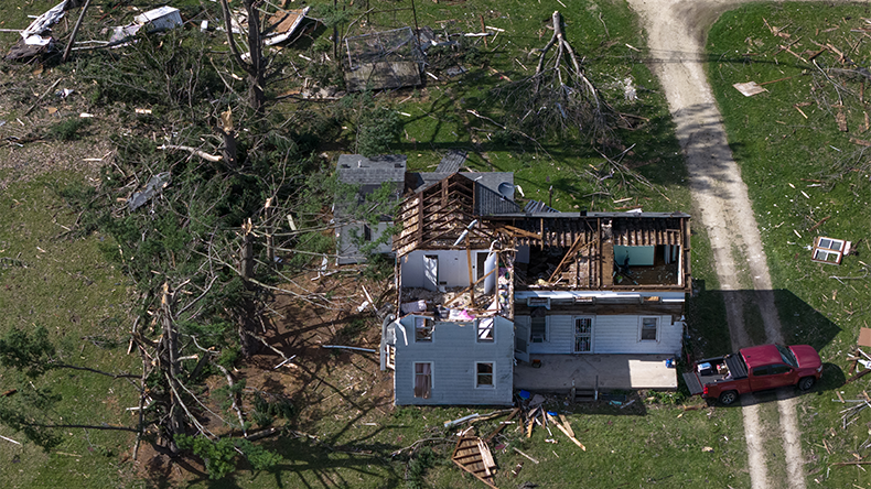 ROCKTON, ILLINOIS - APRIL 18: An aerial view shows damage to a farmhouse from yesterday's tornado on April 18, 2026 near Rockton, Illinois.  more than 30 tornadoes in the Midwest