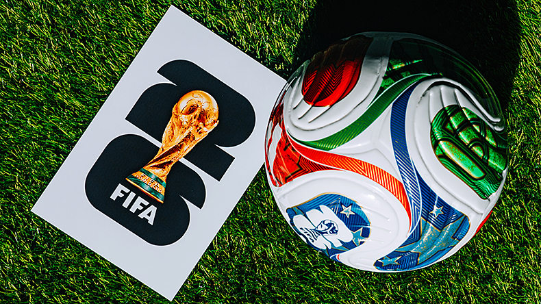 Official FIFA World Cup 2026 Match ball on pitch and official logo of football tournament in USA, Canada and Mexico