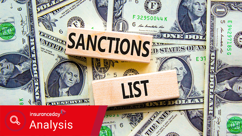 Sanctions list symbol. Wooden blocks with concept words Sanctions list on beautiful background from dollar bills. Business political sanctions list concept. 