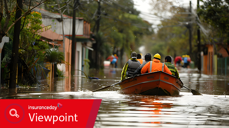 Rescue workers in boats and rafts help victims of flooding after heavy rains and floods.