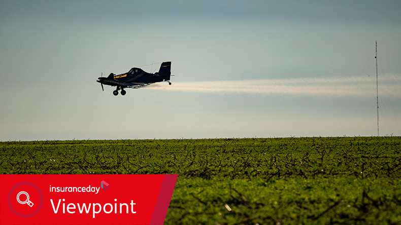 Aerial Applicator Dusting Crops in the Midwest
