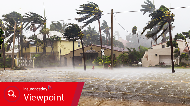 Flooded Las Olas Blvd and Palm trees blowing in the winds, catastrophic hurricane Irma.