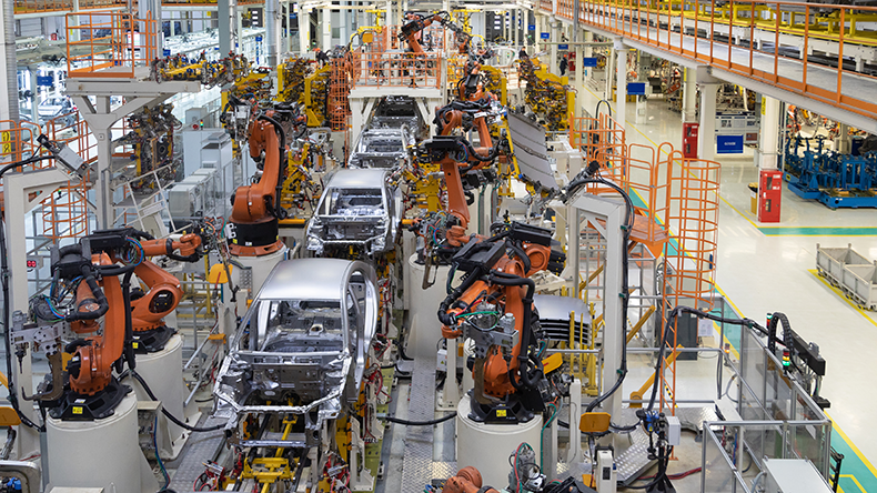 Body of car on conveyor top view. Modern Assembly of cars at the plant. The automated build process of the car body.