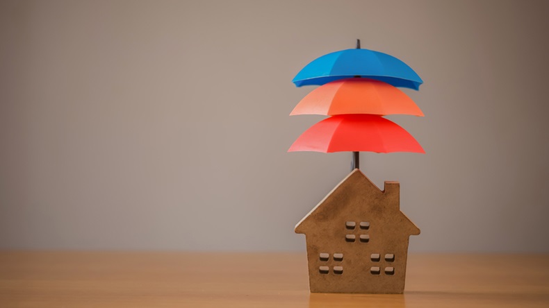 Mortage insurance (JETACOM AUTOFOCUS/Shutterstock.com)