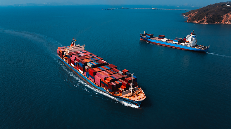 Shipping containerships arriving and leaving port
