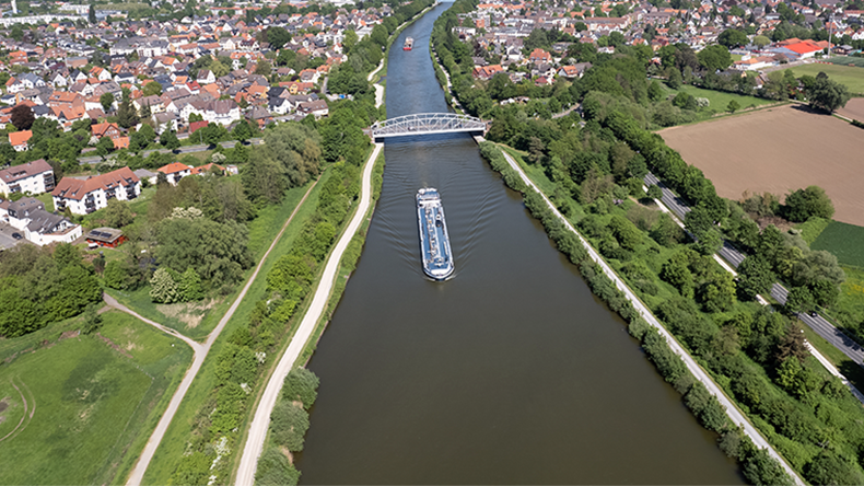 Ship sailing under a cloudy sky Hanover Seelze Germany a drone view image