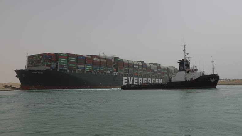 Ever Given and tug. Credit Suez Canal Authority