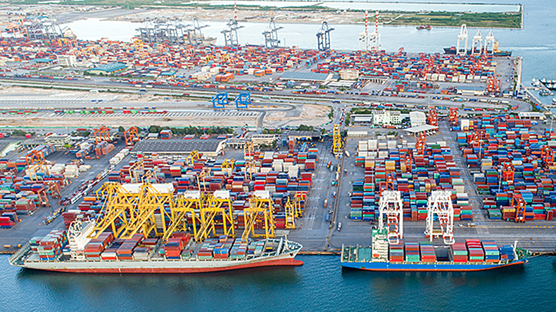 Containership berthed at port, aerial view