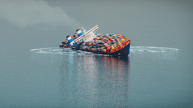 A large containership tilted and sank sideways in the ocean.